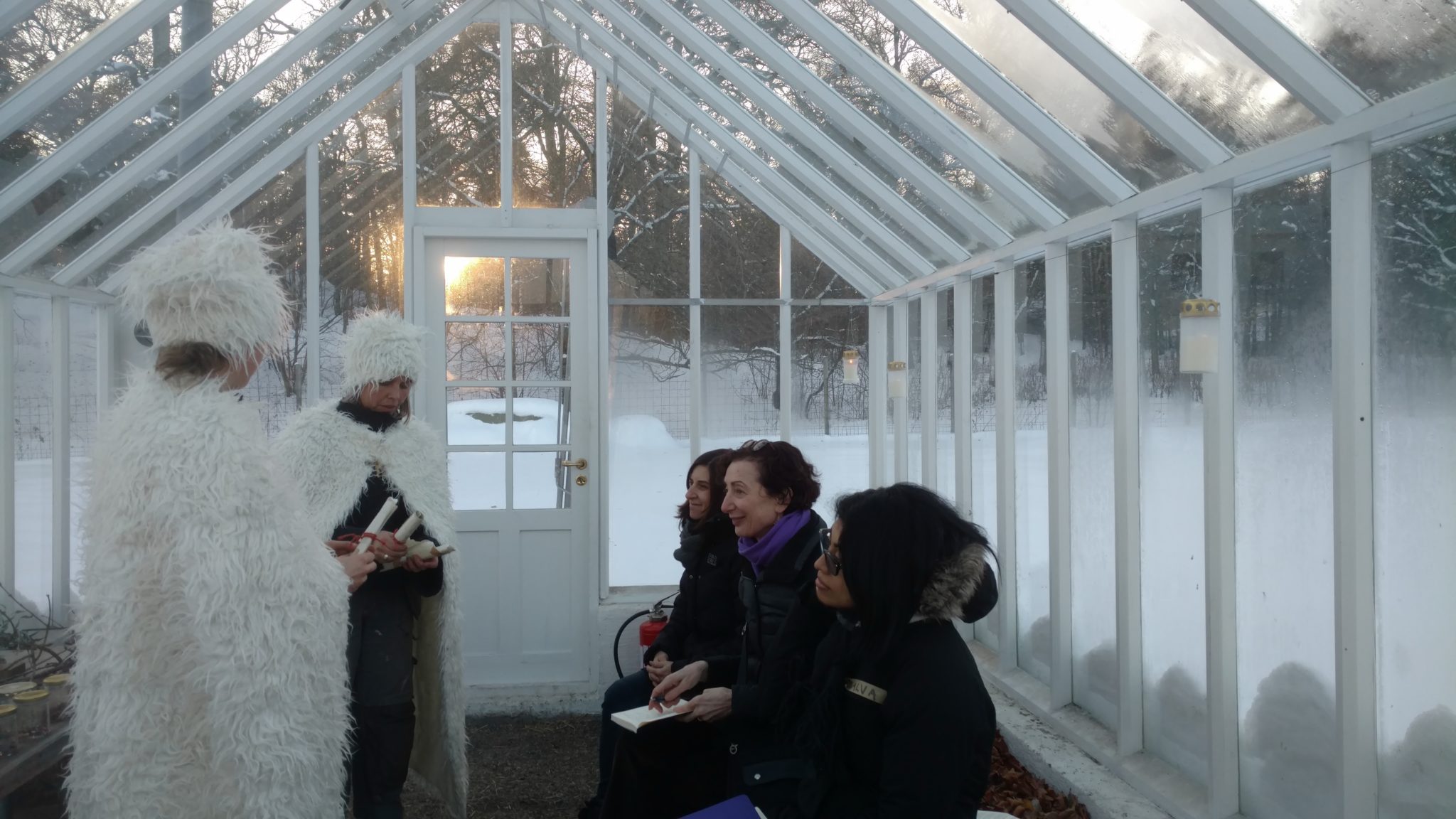 teachers meeting in a glass house