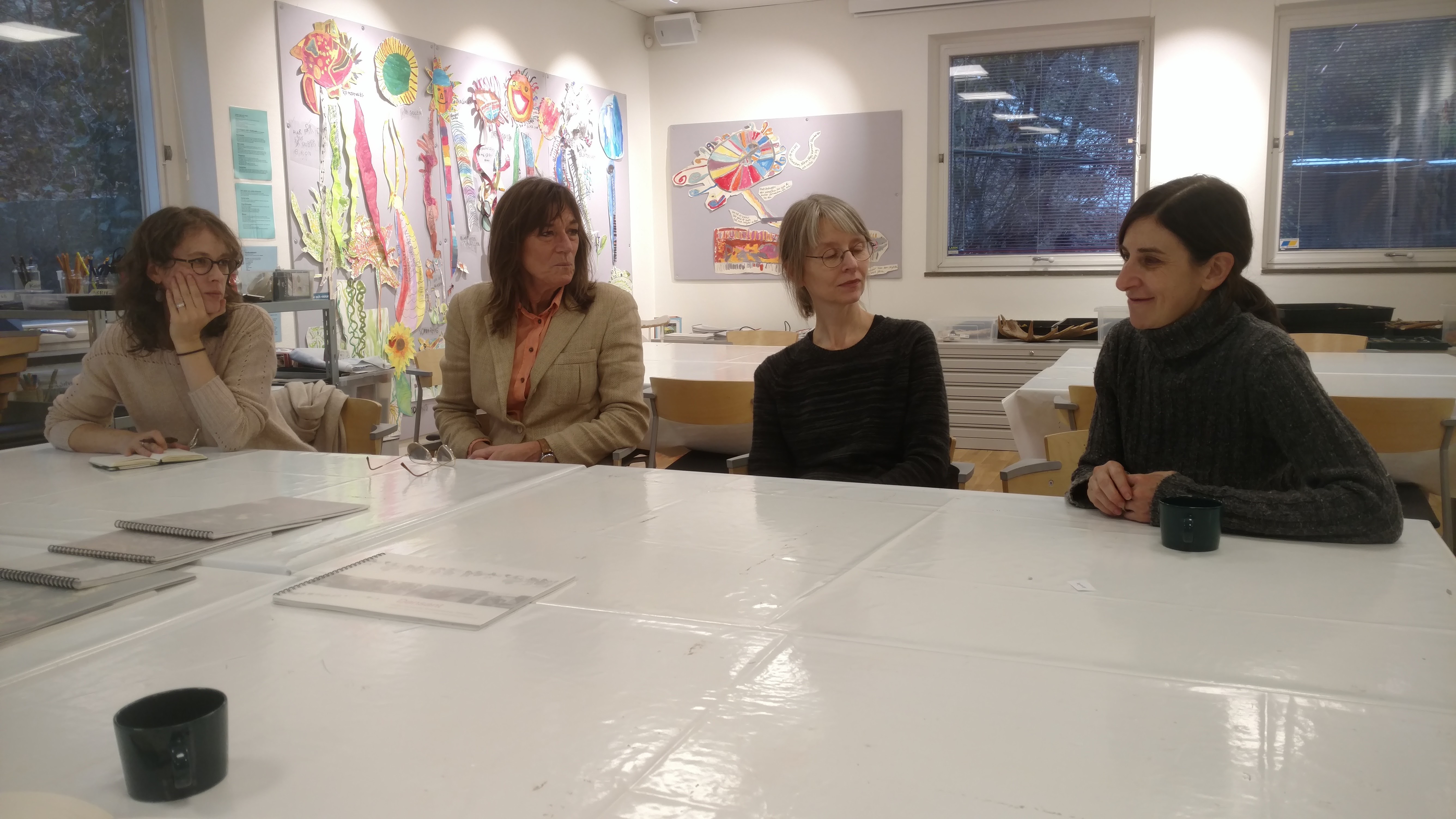 teachers discussing at a table