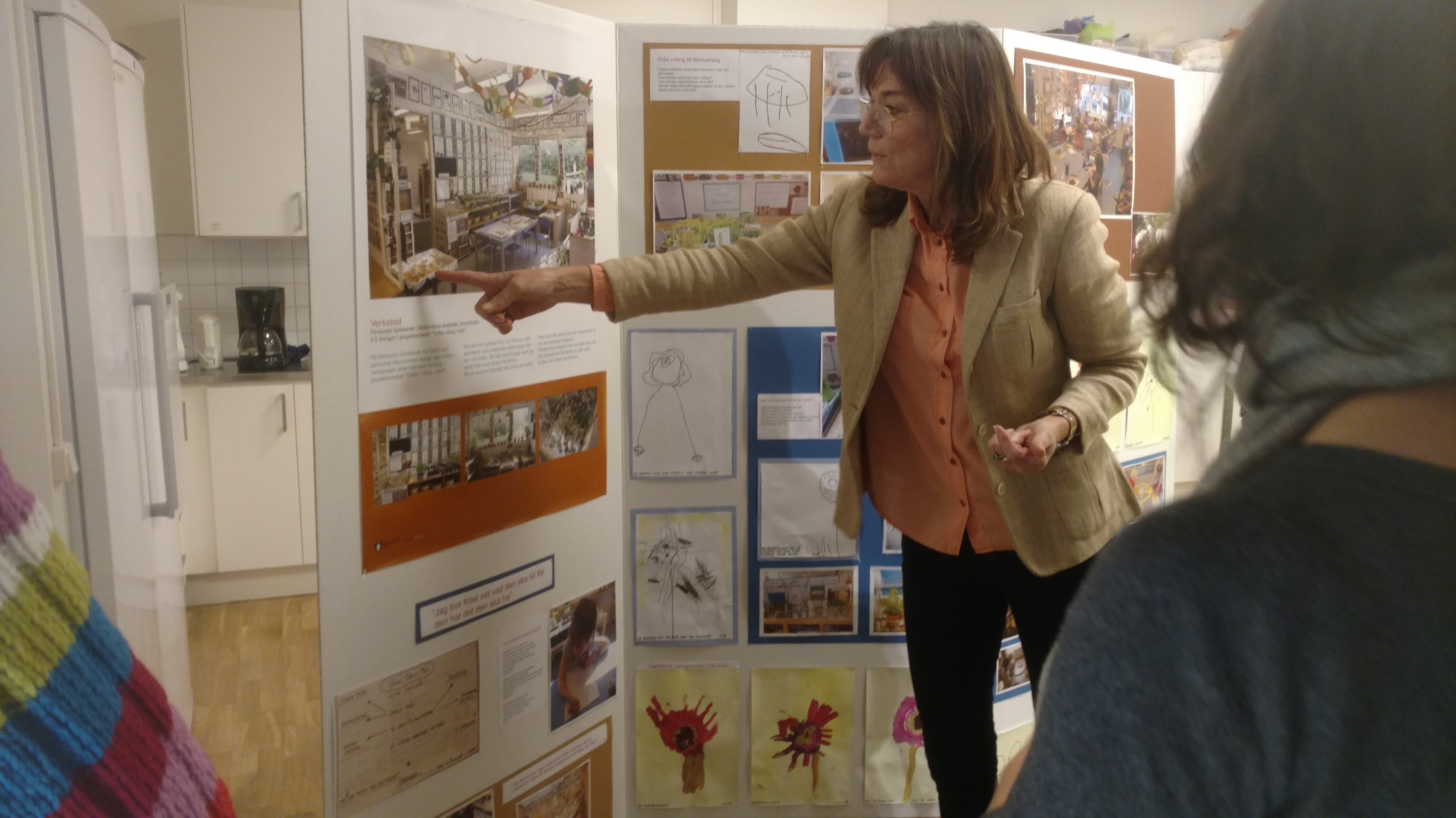 teacher pointing on a board