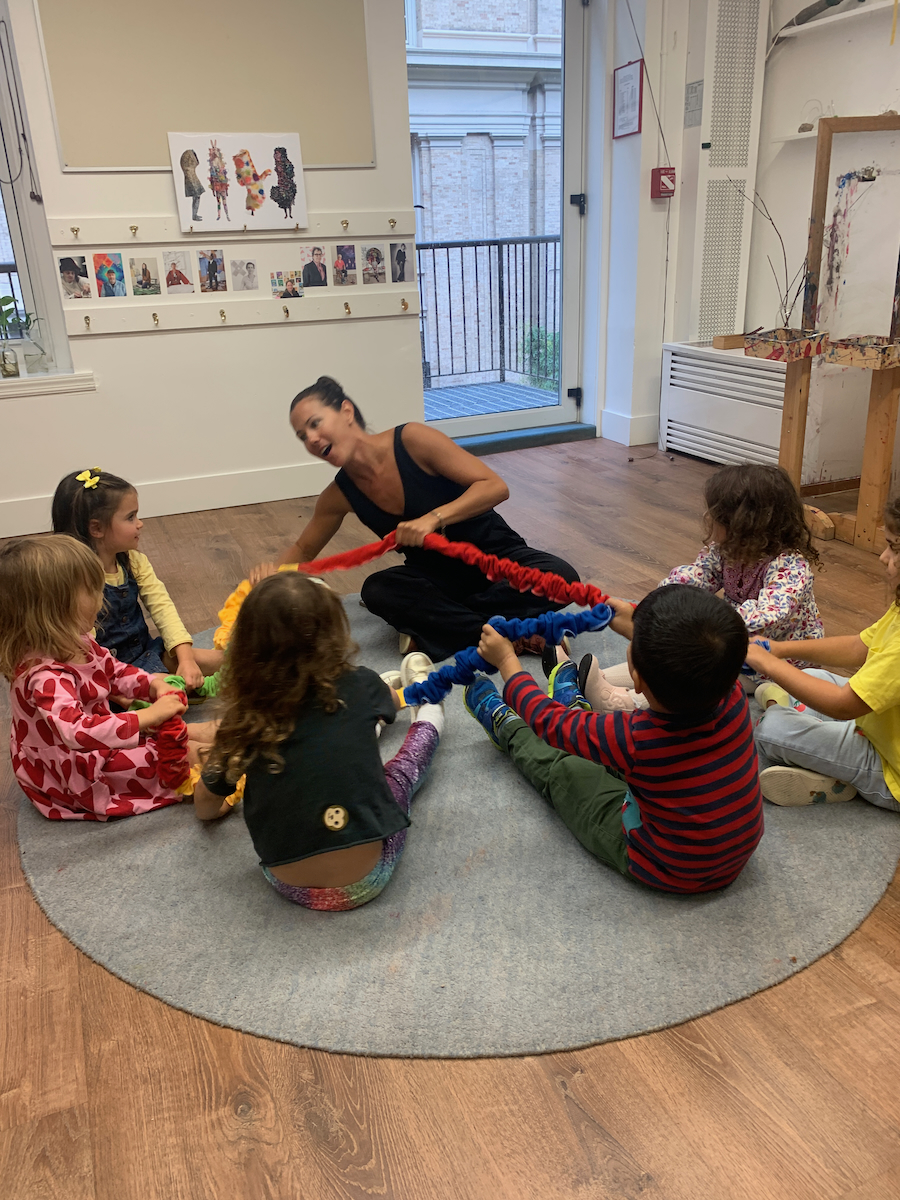 children playing with a circle rope