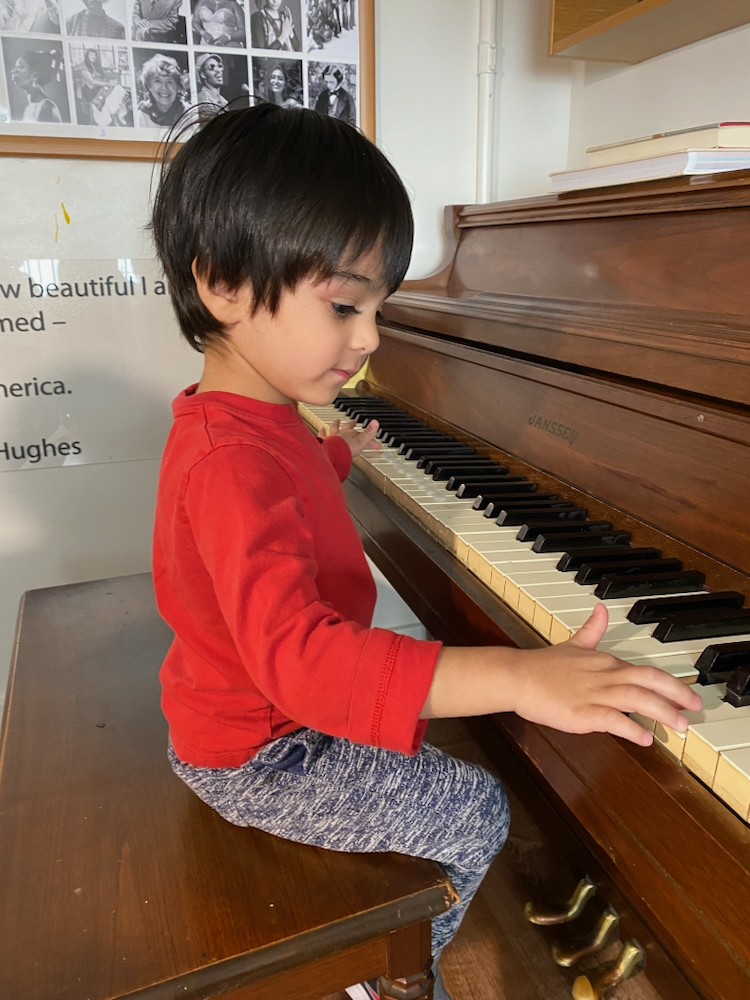 child playing piano