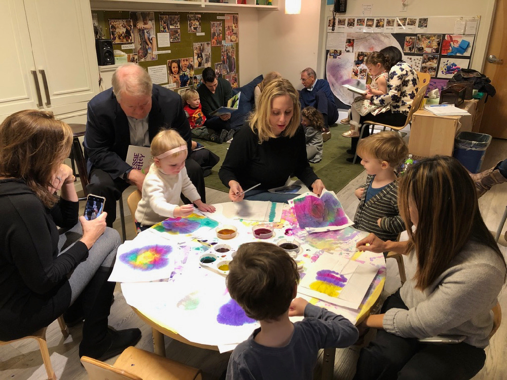 grandparents painting with children