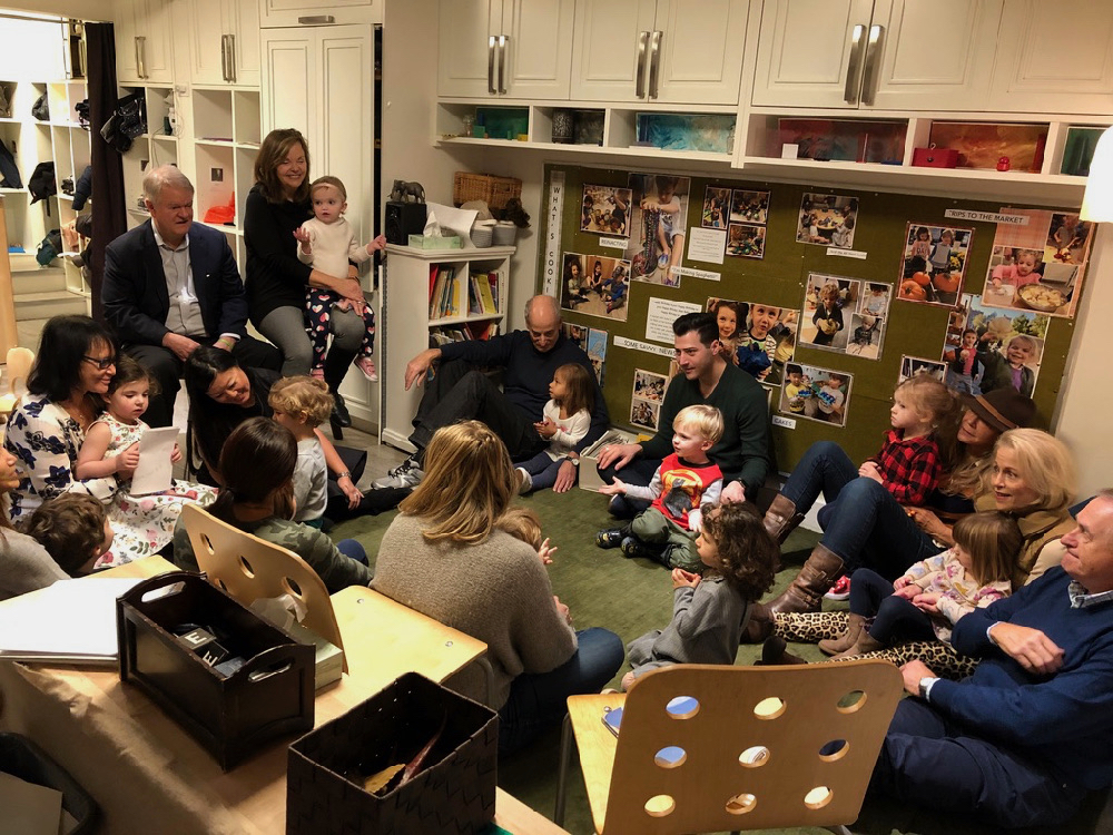 children singing together with their grandparents